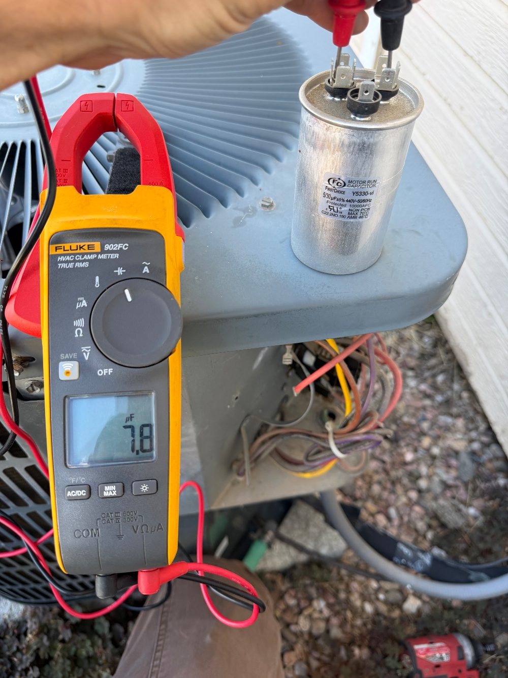 Testing an AC run capacitor against its rating with an HVAC clamp meter