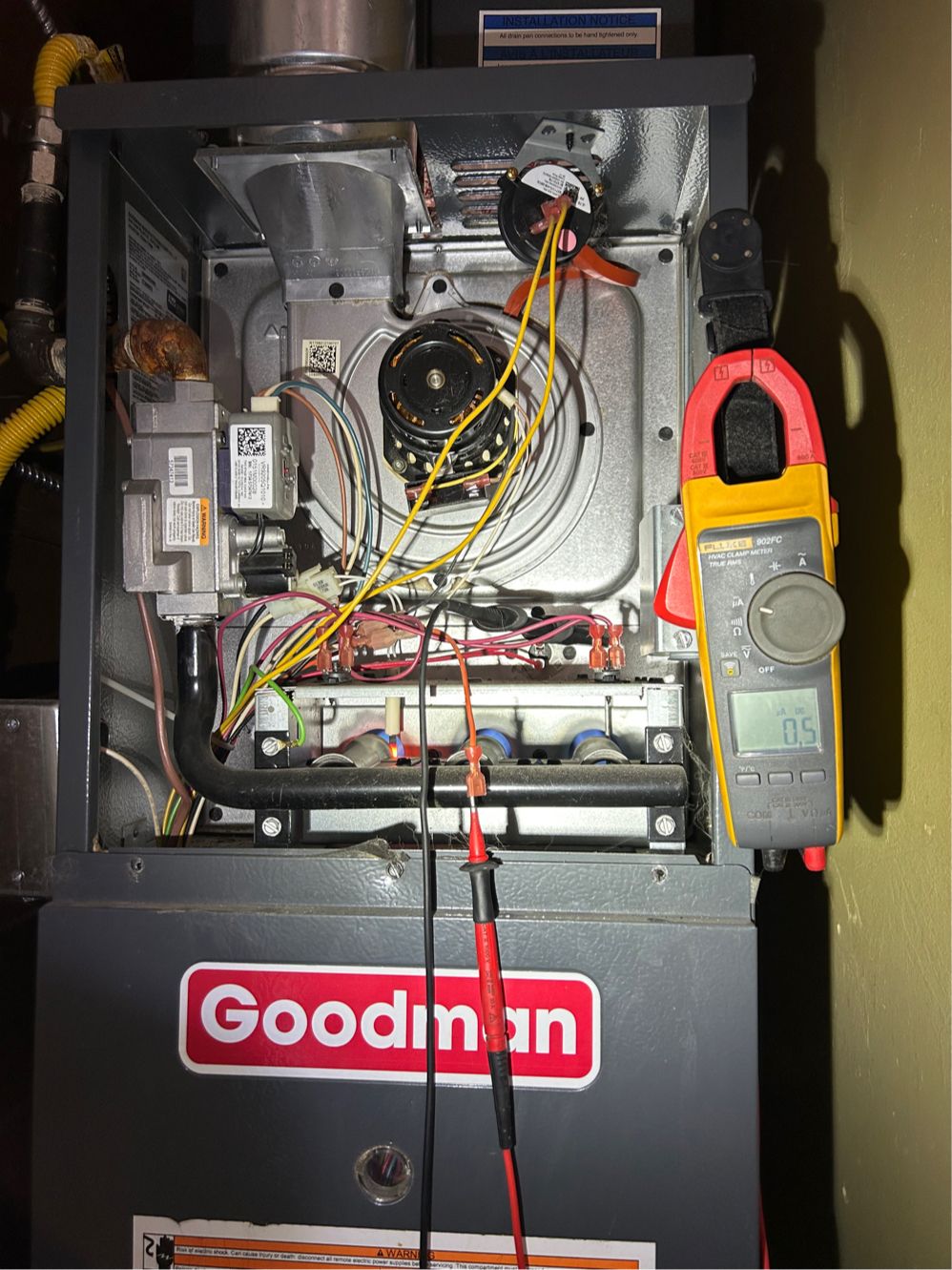 Metering a weak flame-sensor signal on an open gas furnace